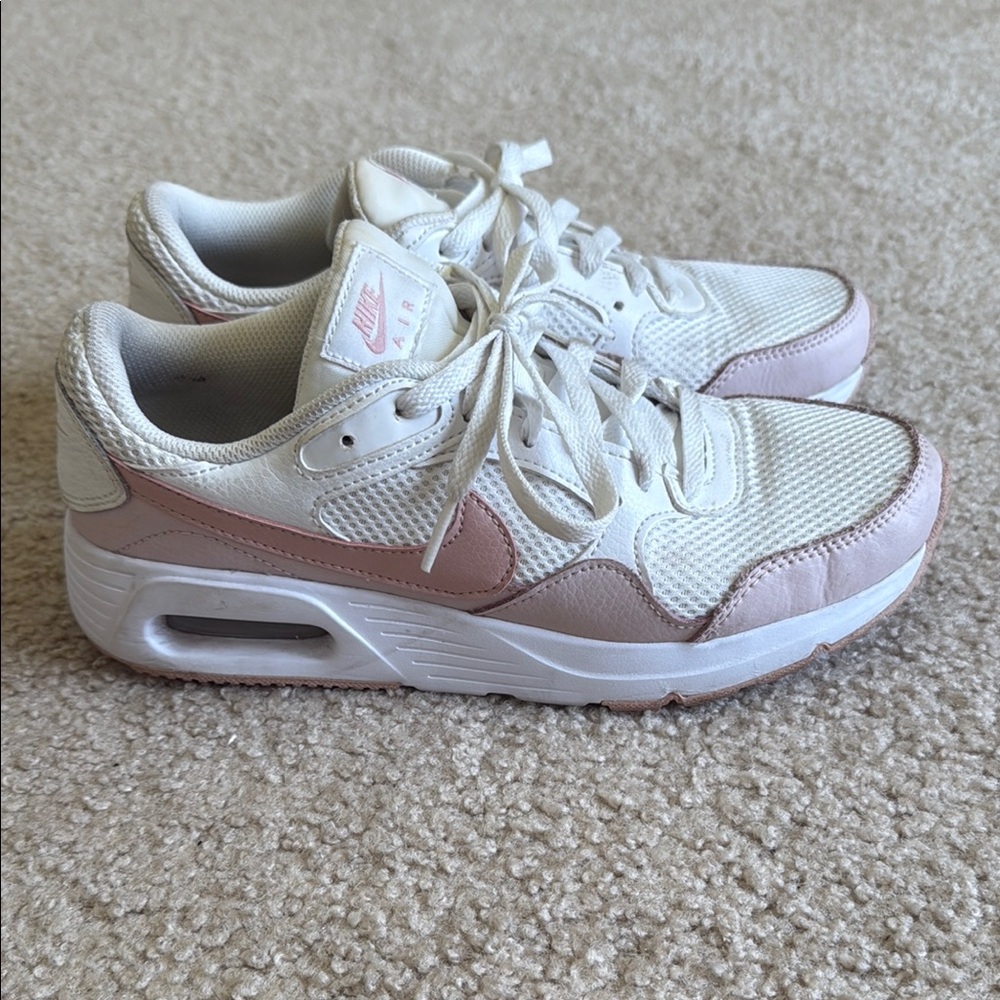 Nike White and Pink Sneakers with Air Max Comfort Likely Worn